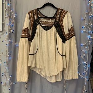 Free People Flowy shirt.